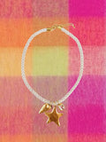 The Ivory Triple Charm Cord